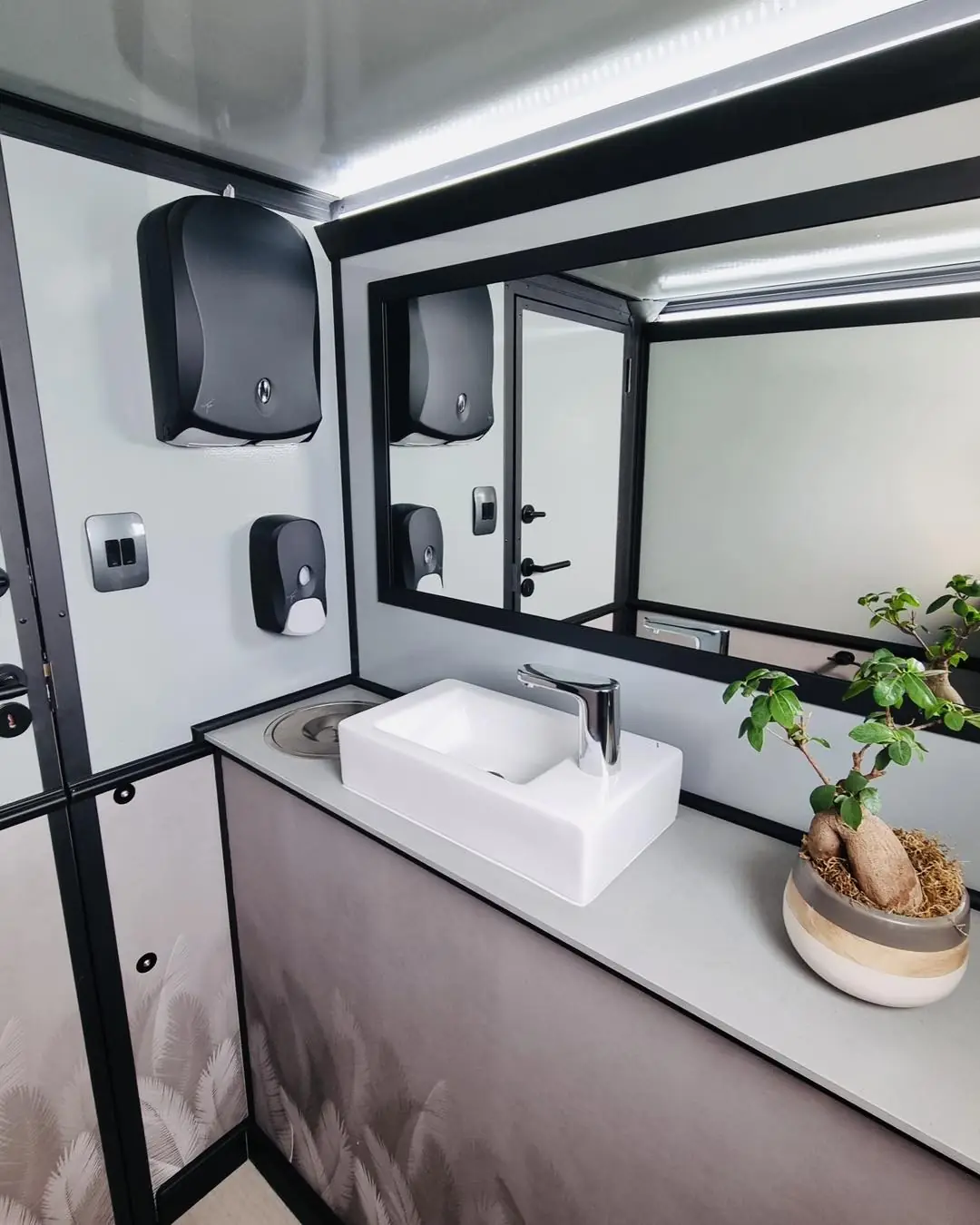 Restroom trailer sink and mirror